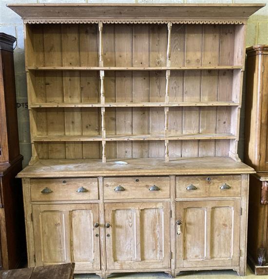 A late Victorian pine dresser, width 200cm depth 54cm height 238cm